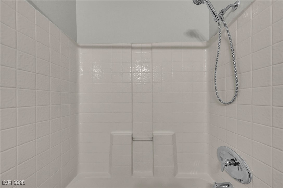 7147 South Durango Drive, Unit 304 Las Vegas, NV 89113 - Photo 16 of 27 Bathroom view of shower / washtub combination