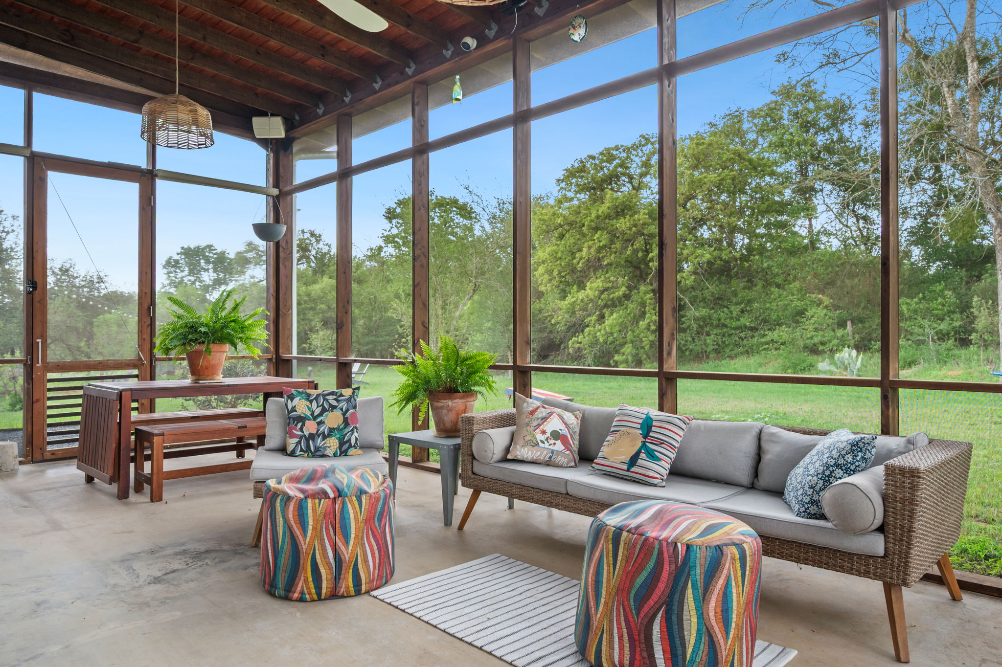 534 Old McDade Road Elgin, TX 78621 - Photo 20 of 40 Screened in porch has a pet door leading to it, as well as an automatic water filler for pet water.