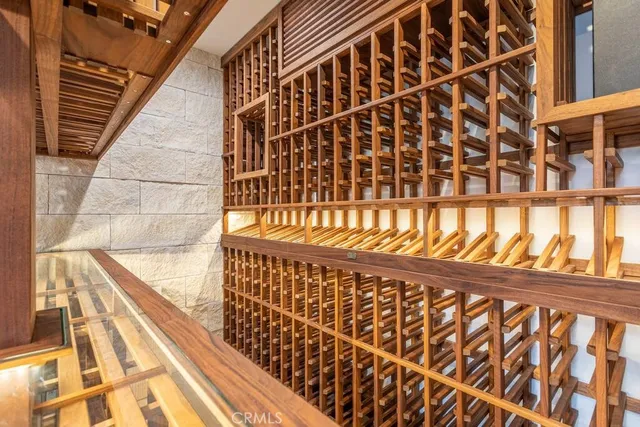 a bedroom with a bed and a lamp