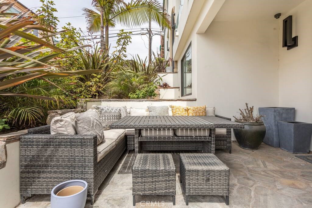 314 32nd Street Manhattan Beach, CA 90266 - Photo 20 of 27 a roof deck with couches and potted plants