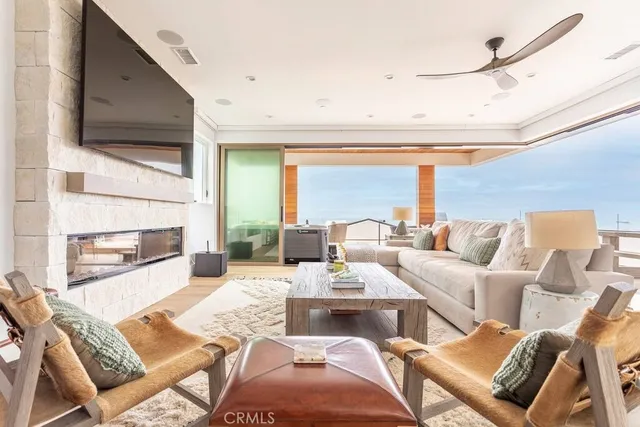 a living room with furniture or outdoor view and a fireplace