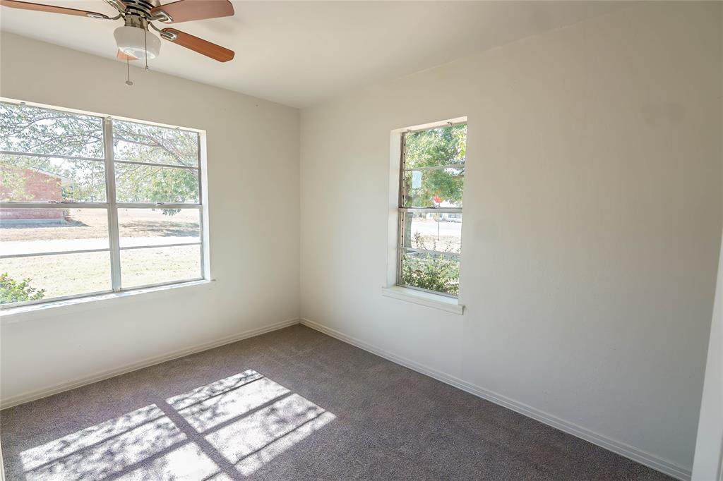 1226 Clay Street Nocona, TX 76255 - Photo 25 of 31 a view of an empty room with a window