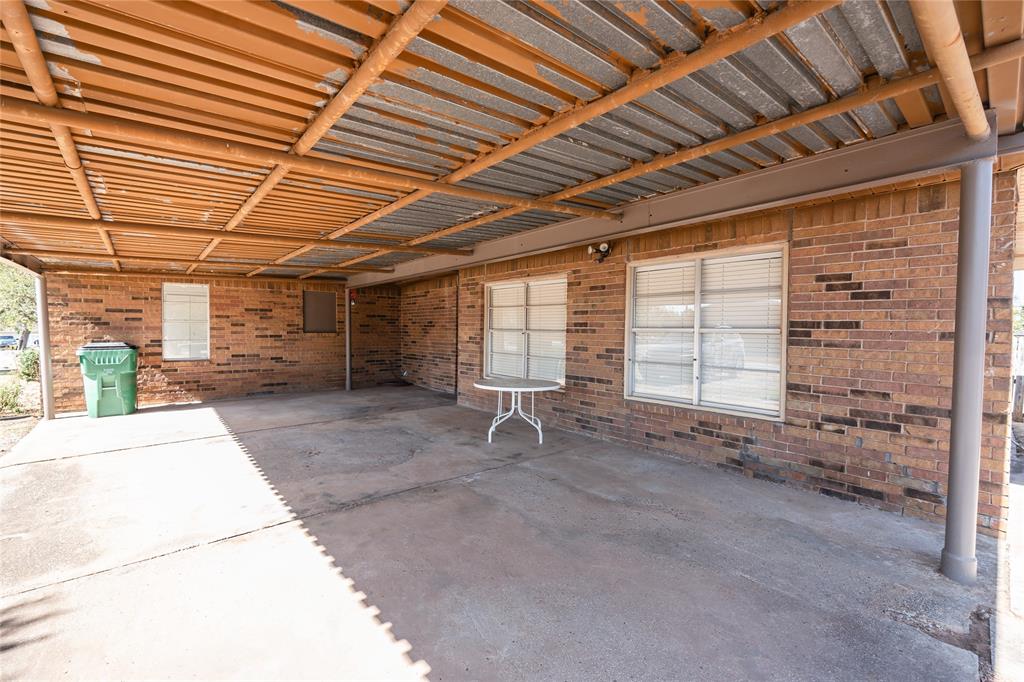 1226 Clay Street Nocona, TX 76255 - Photo 28 of 31 a view of an empty room with windows