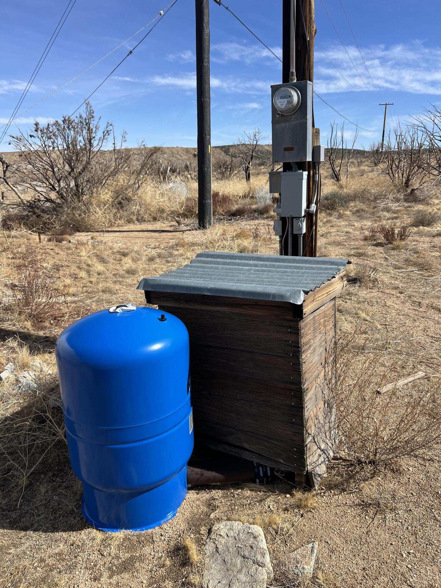 17120 Bob's Gap Road Valyermo, CA 93563 - Photo 18 of 26 a view of a terrace with a bench