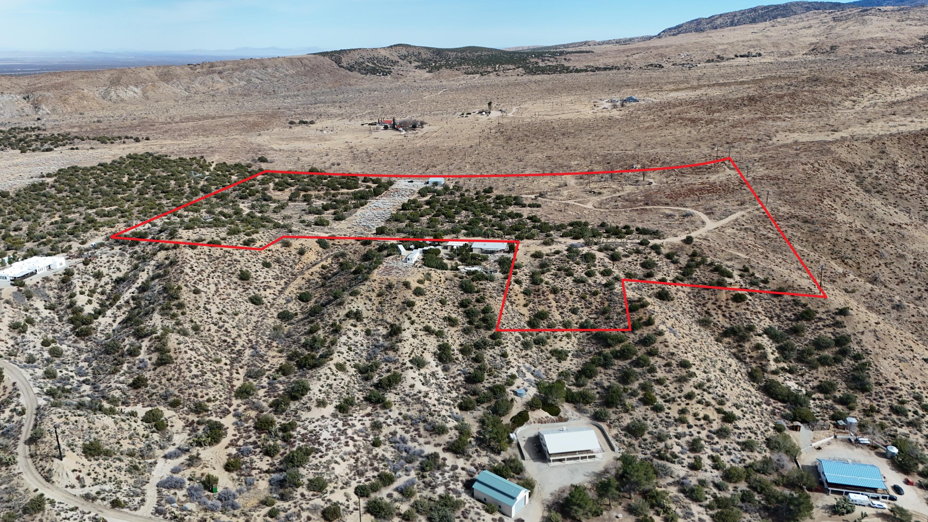 17120 Bob's Gap Road Valyermo, CA 93563 - Photo 3 of 26 a view of lot of flowers and oven