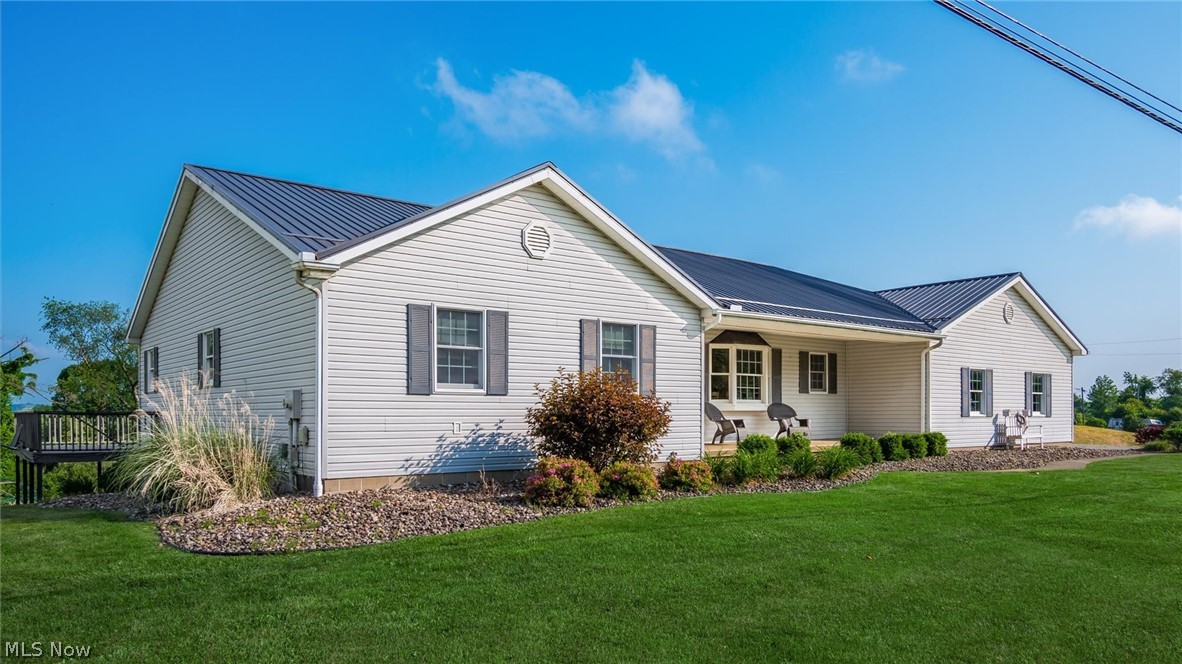 9393 Pioneer Road Byesville, OH 43723 - Photo 2 of 35 Ranch-style home with a front lawn