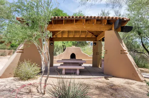 a front view of house and yard with green space