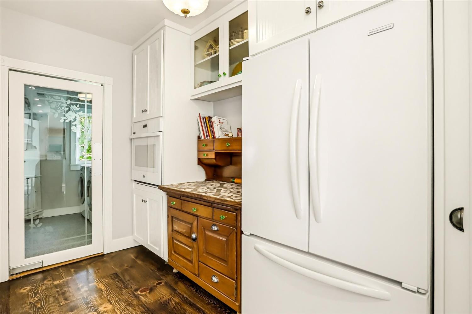 203 Prospect Street Nevada City, CA 95959 - Photo 11 of 99 a kitchen with stainless steel appliances granite countertop a refrigerator and a stove