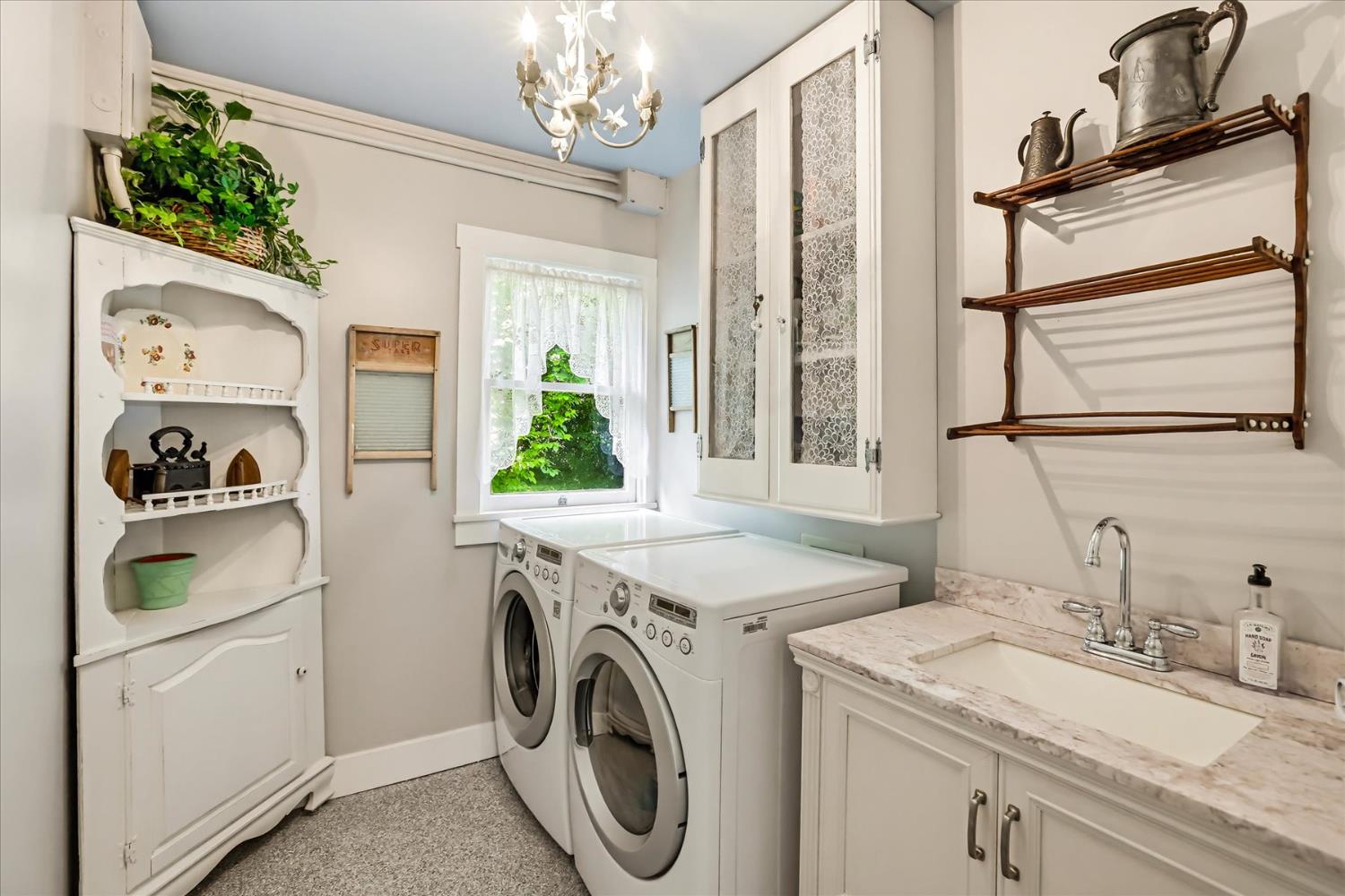203 Prospect Street Nevada City, CA 95959 - Photo 12 of 99 a utility room with sink dryer and washer