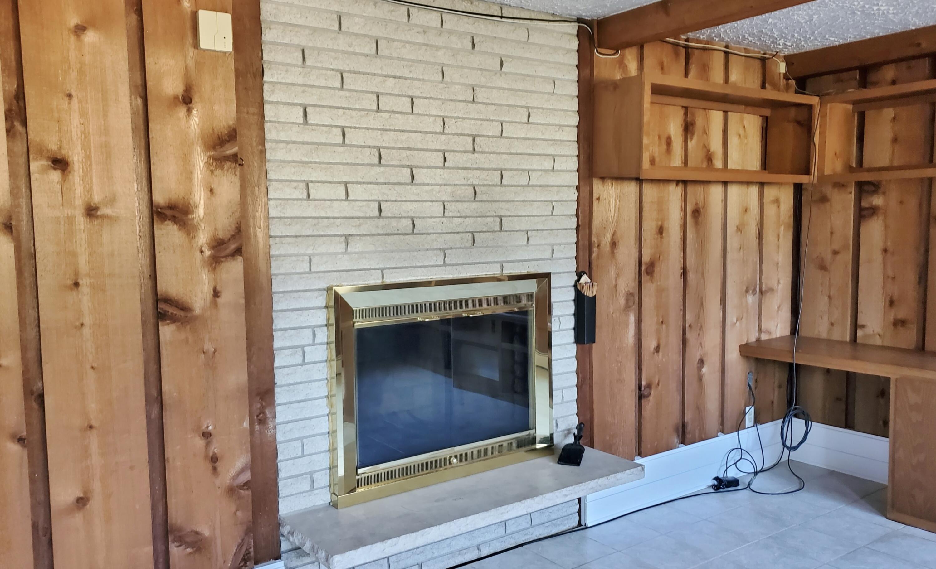 1441 North Wozniak Road La Porte, IN 46350 - Photo 33 of 46 a living room with a fireplace