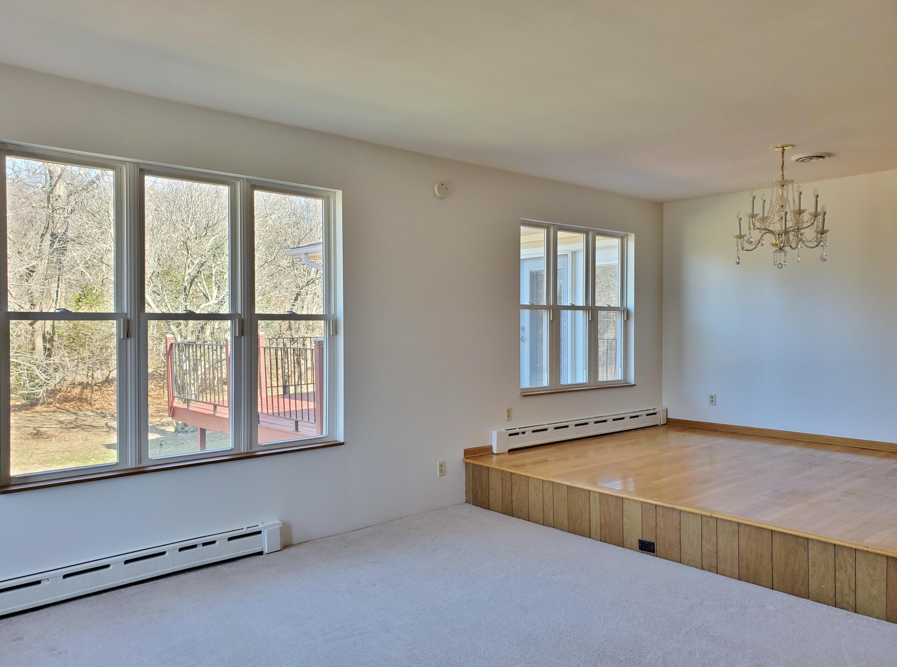 1441 North Wozniak Road La Porte, IN 46350 - Photo 7 of 46 a living room with a large window