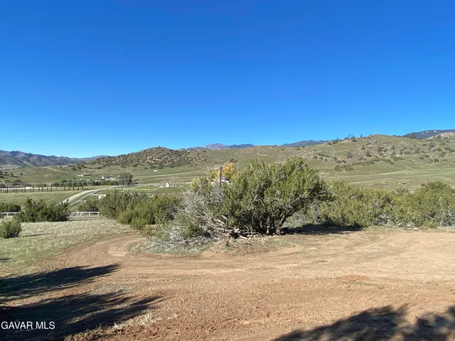 a view of a mountain with a mountain