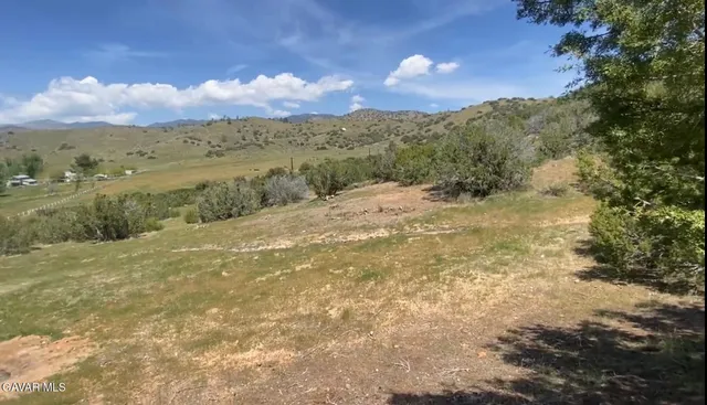 a view of a lake with a mountain
