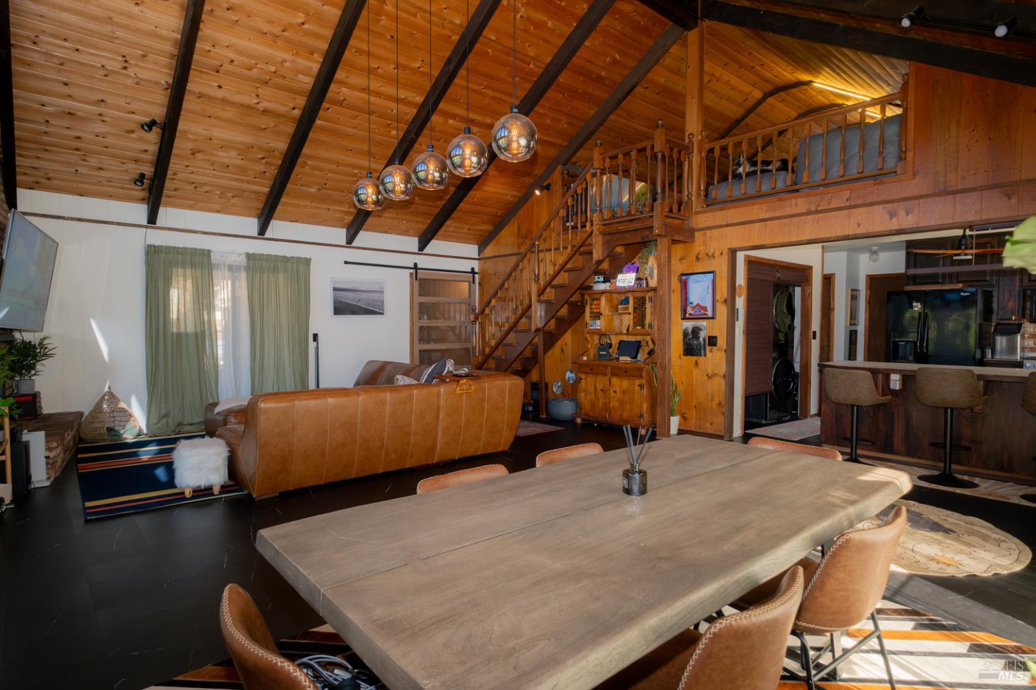 18279 Hidden Valley Road Hidden Valley Lake, CA 95467 - Photo 19 of 49 a bedroom with bed and a chandelier