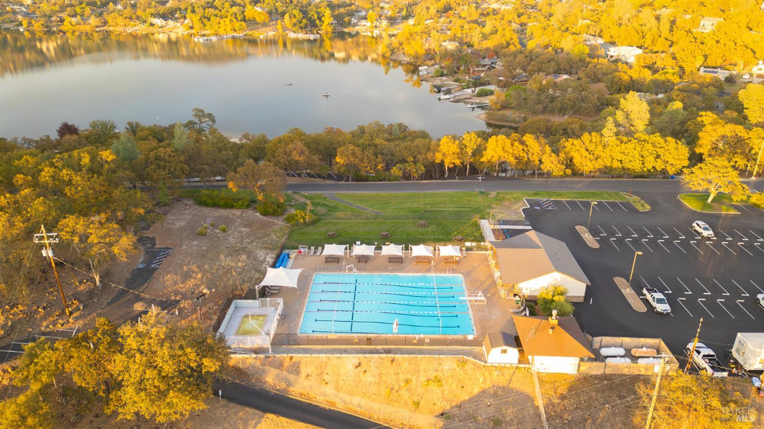 18279 Hidden Valley Road Hidden Valley Lake, CA 95467 - Photo 33 of 49 a view of a lake with a yard and mountain view