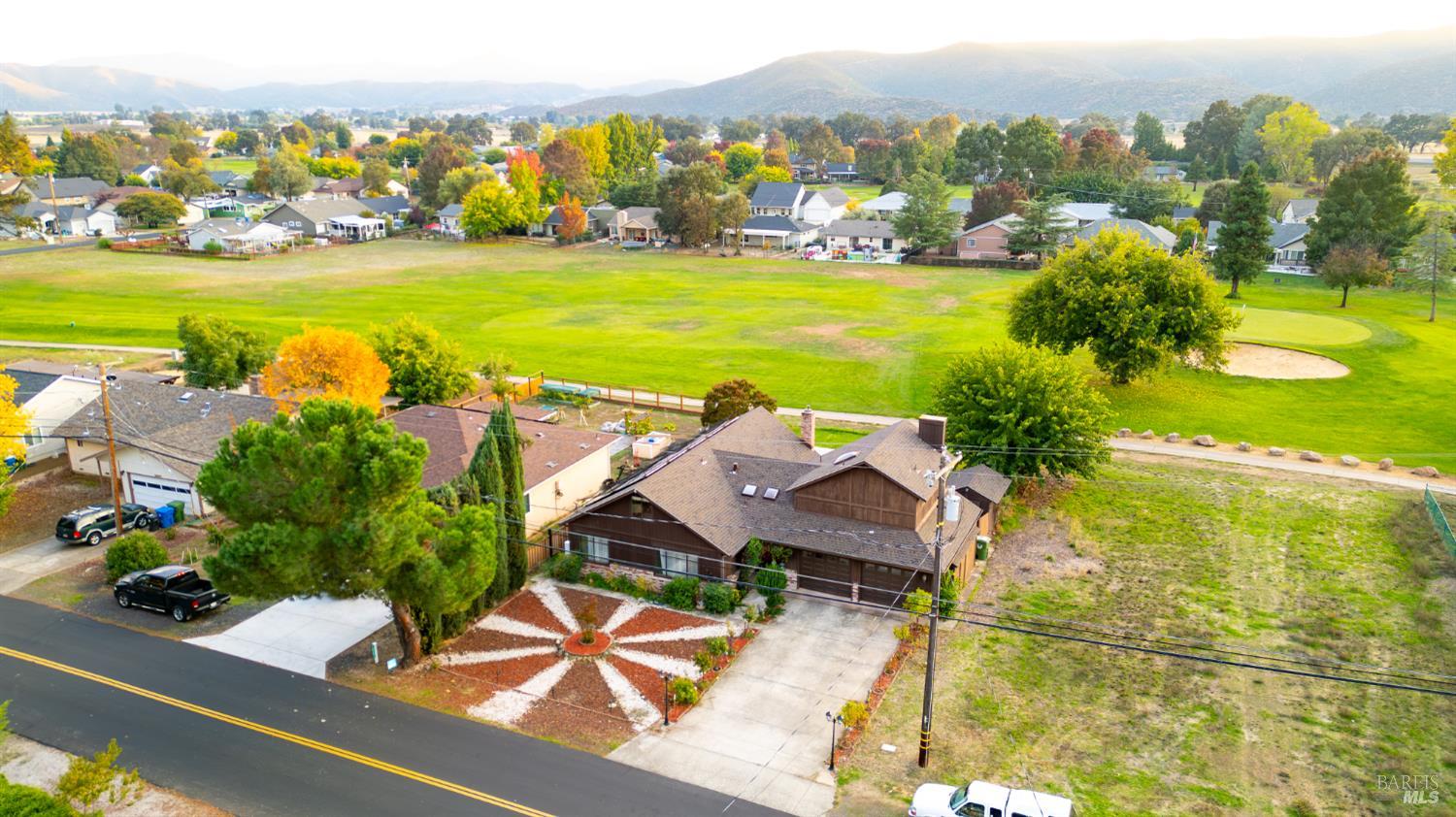 18279 Hidden Valley Road Hidden Valley Lake, CA 95467 - Photo 49 of 49 an aerial view of residential houses with outdoor space and ocean view