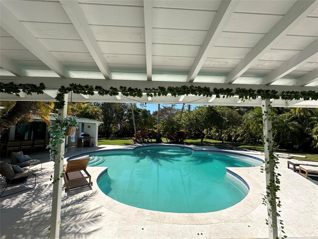 6205 Southwest 108th Street Pinecrest, FL 33156 - Photo 7 of 28 a view of a swimming pool