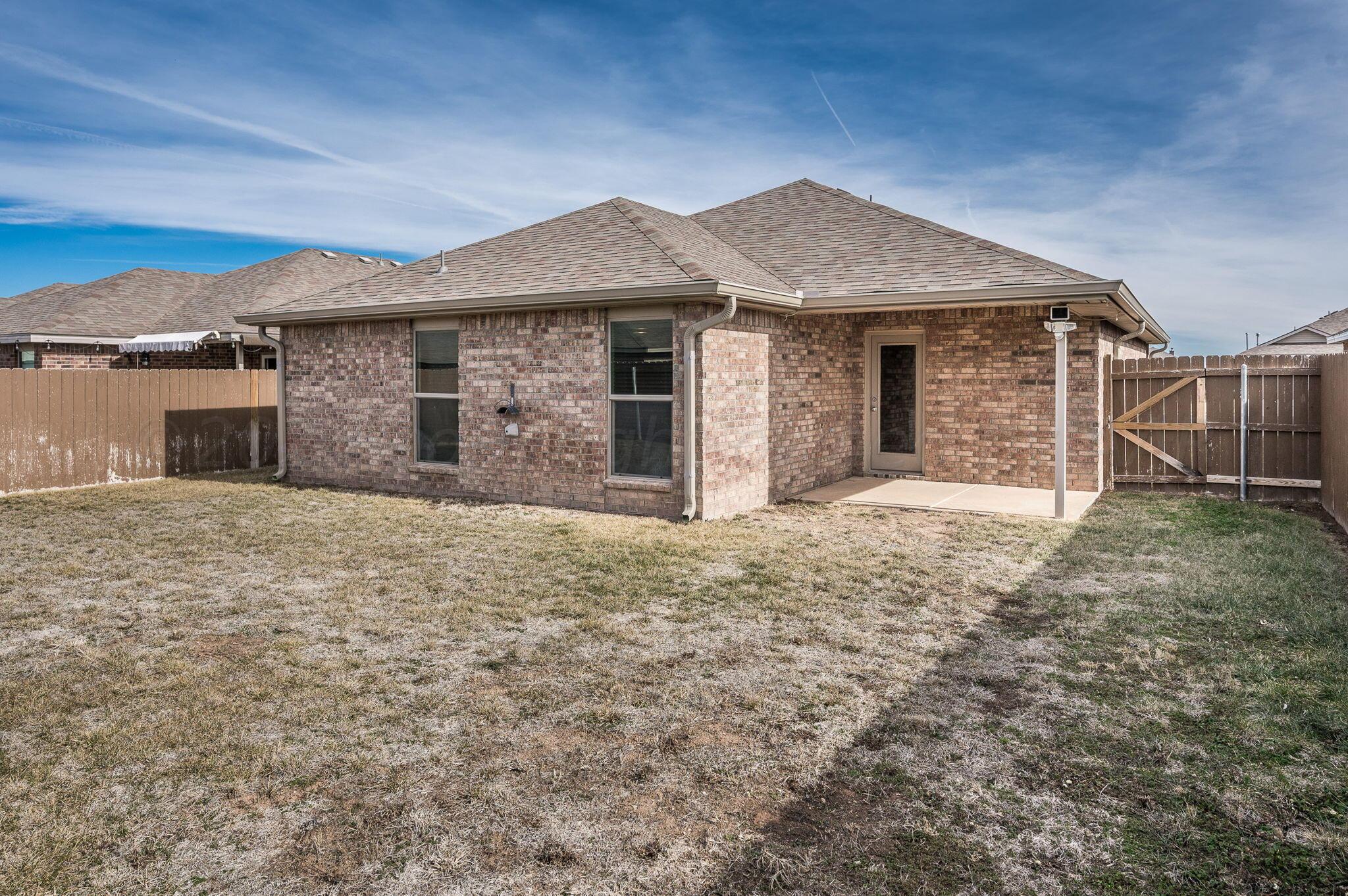 4806 Eberly Street Amarillo, TX 79118 - Photo 19 of 19 front view of a house with a yard