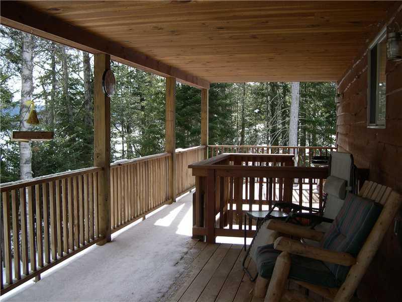 129 2 Rod Road Rangeley, ME 04970 - Photo 15 of 26 Patio/Deck. Covered porch has...