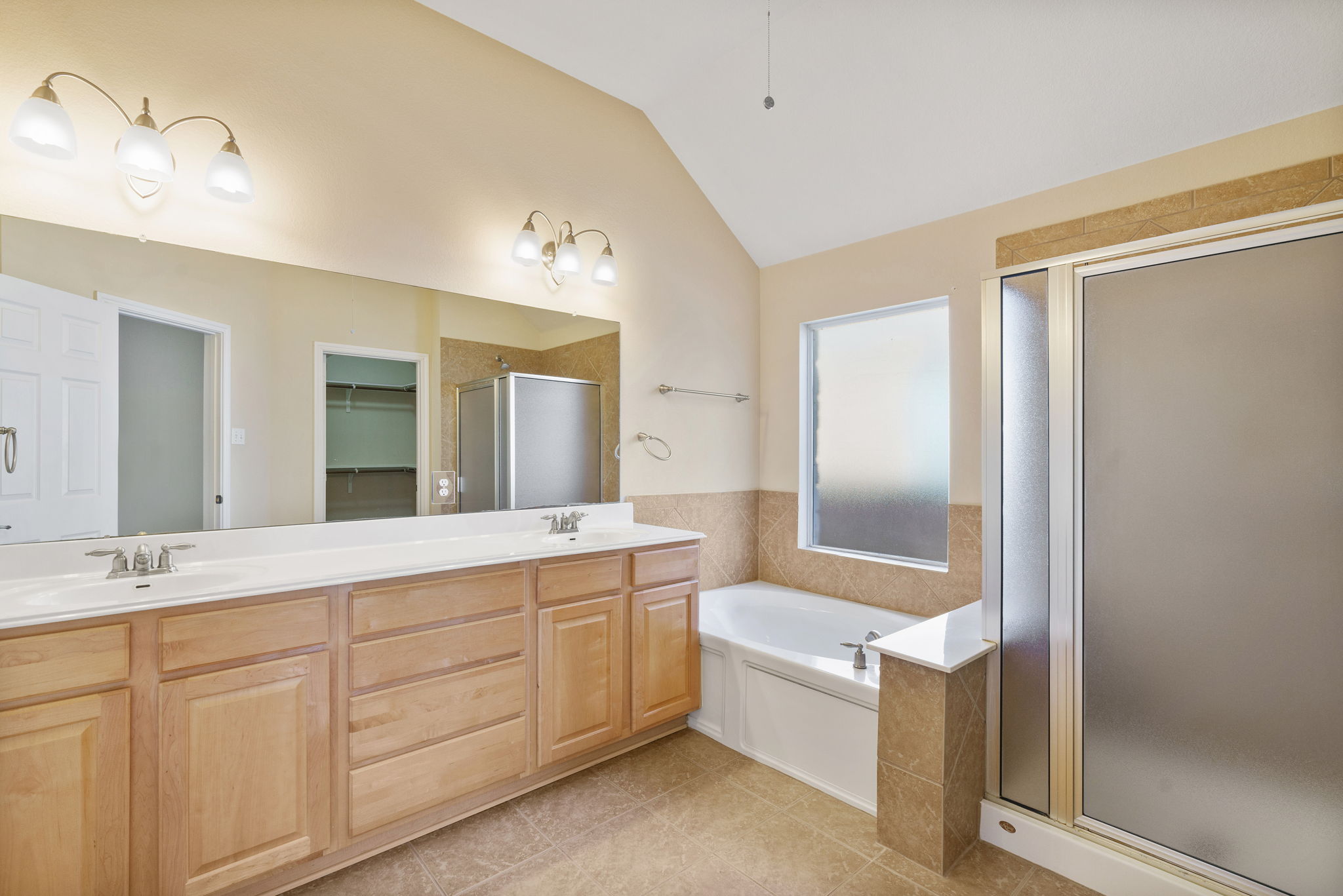 3501 Shellcastle Lane Round Rock, TX 78681 - Photo 12 of 19 a spacious bathroom with a double vanity sink mirror and double