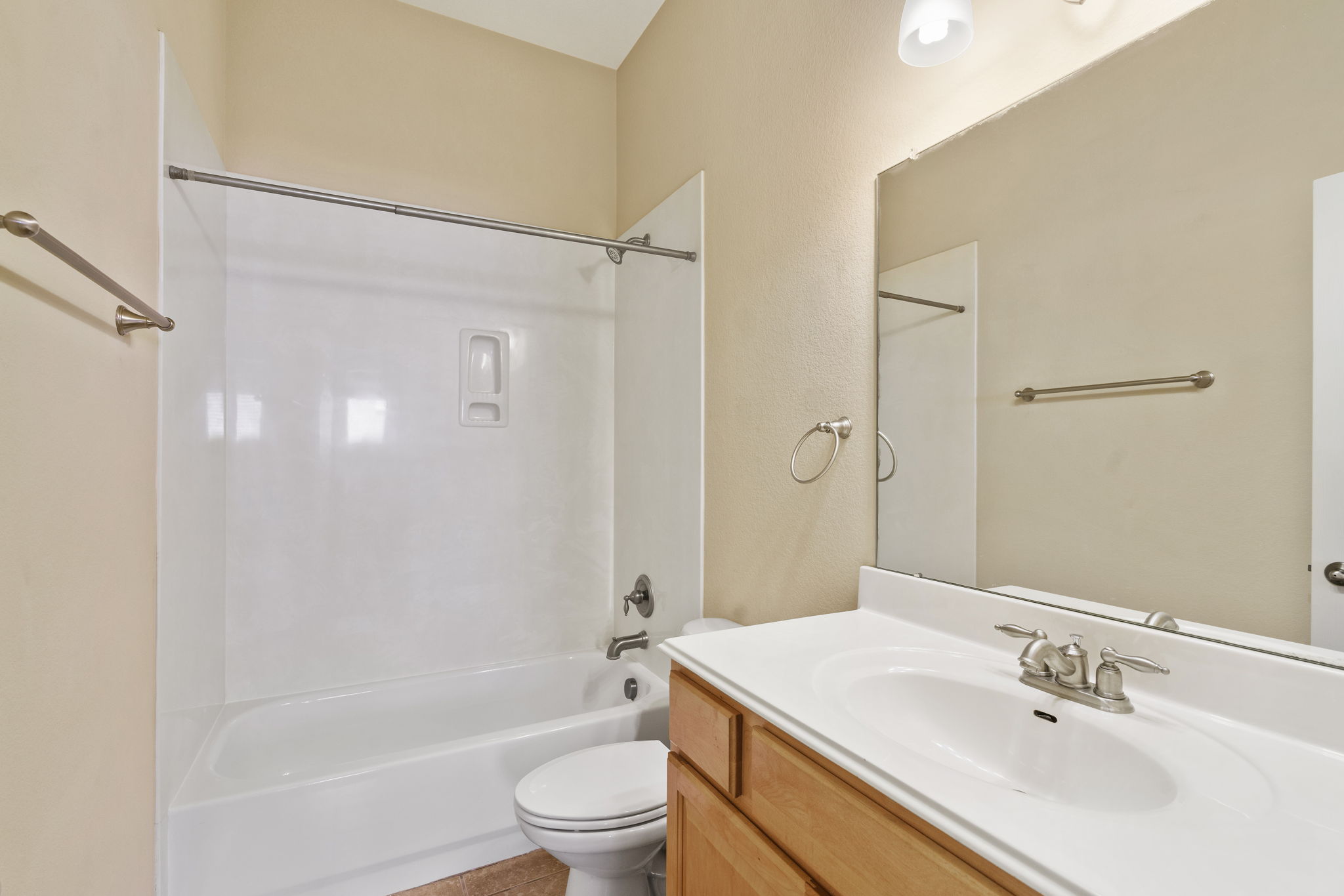 3501 Shellcastle Lane Round Rock, TX 78681 - Photo 16 of 19 a bathroom with a sink toilet and shower
