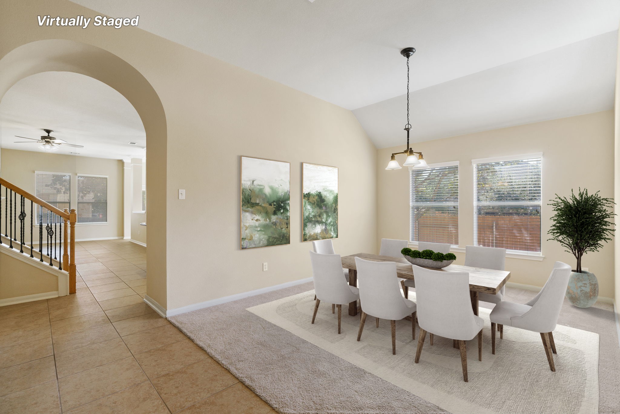 3501 Shellcastle Lane Round Rock, TX 78681 - Photo 4 of 19 a dining room with furniture a chandelier and wooden floor