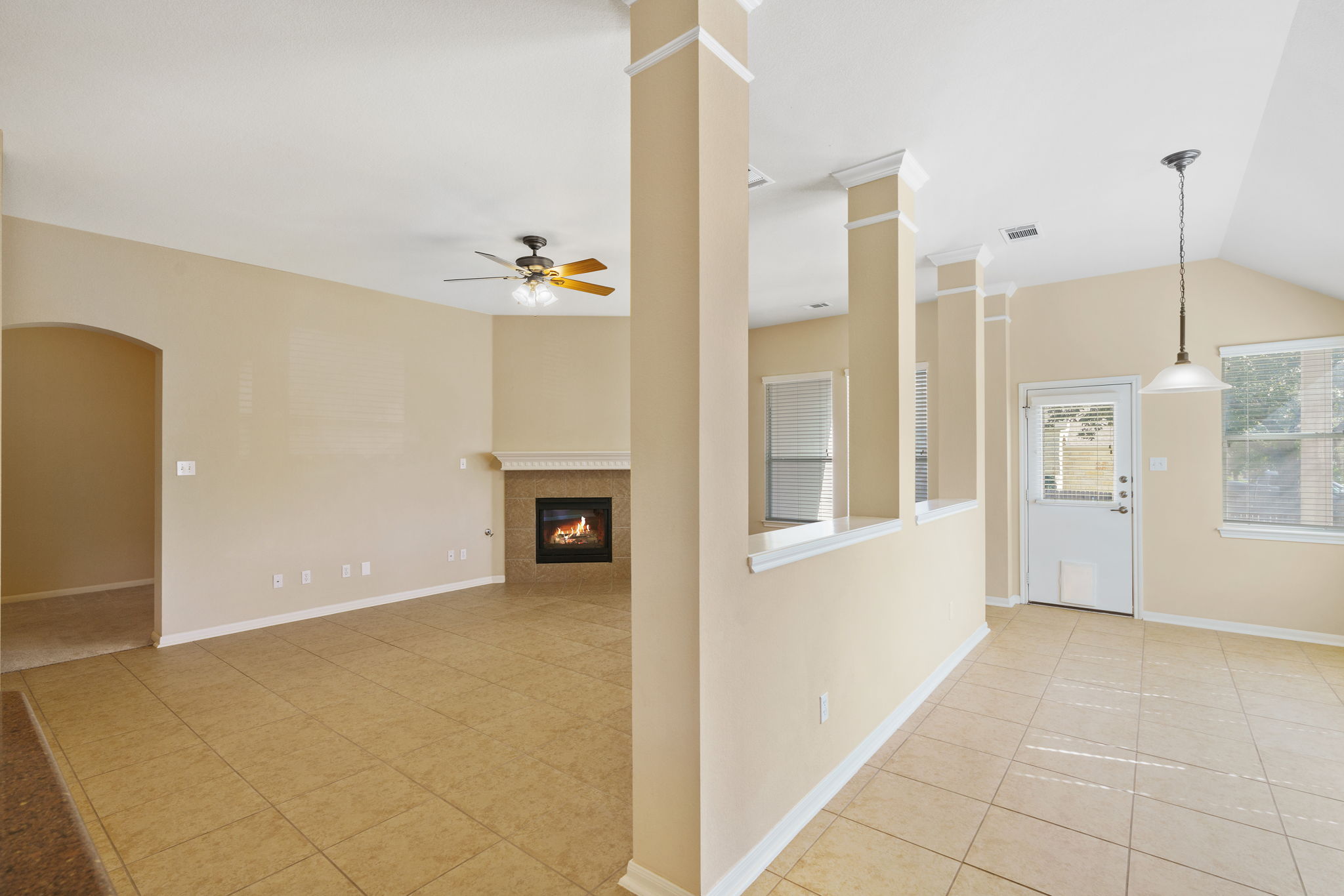 3501 Shellcastle Lane Round Rock, TX 78681 - Photo 10 of 19 a view of an empty room with cabinet and a fireplace