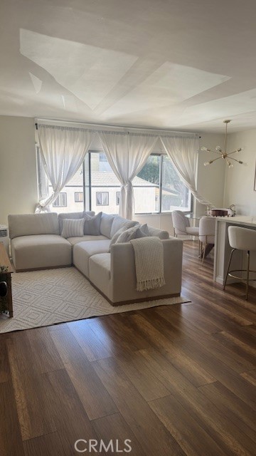 250 Linden, Unit 204 Signal Hill, CA 90802 - Photo 7 of 13 a living room with furniture and a large window