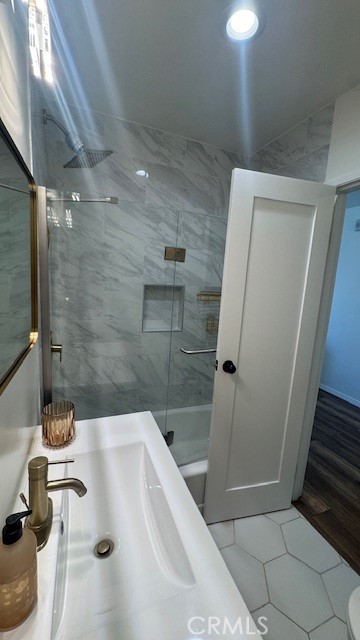 250 Linden, Unit 204 Signal Hill, CA 90802 - Photo 9 of 13 a bathroom with a bathtub and shower