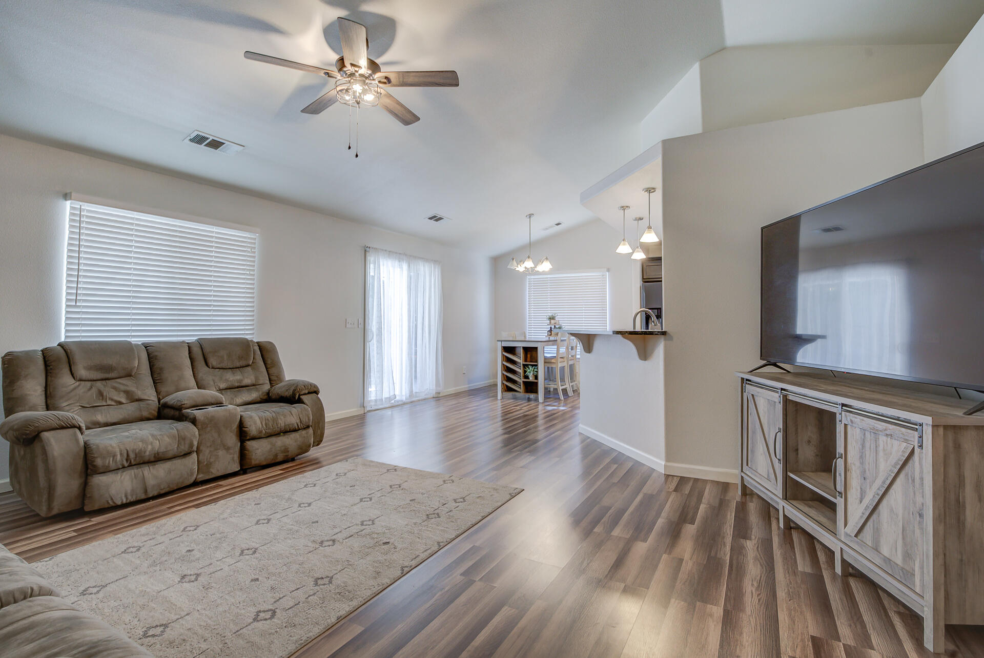 3343 Oak Street Anderson, CA 96007 - Photo 11 of 28 a living room with furniture and a wooden floor