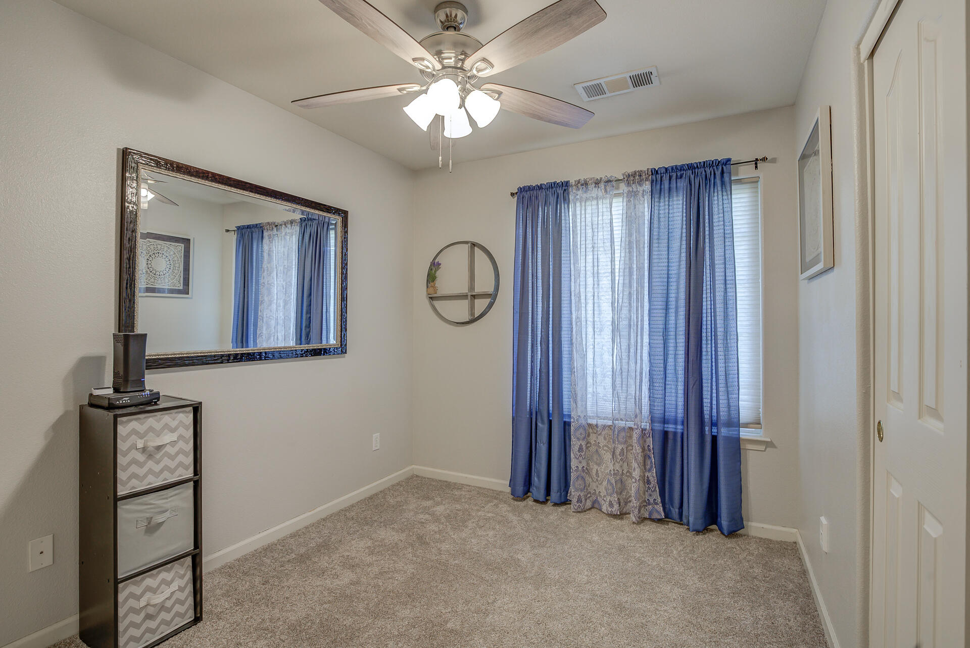 3343 Oak Street Anderson, CA 96007 - Photo 14 of 28 a view of a livingroom with a chandelier fan