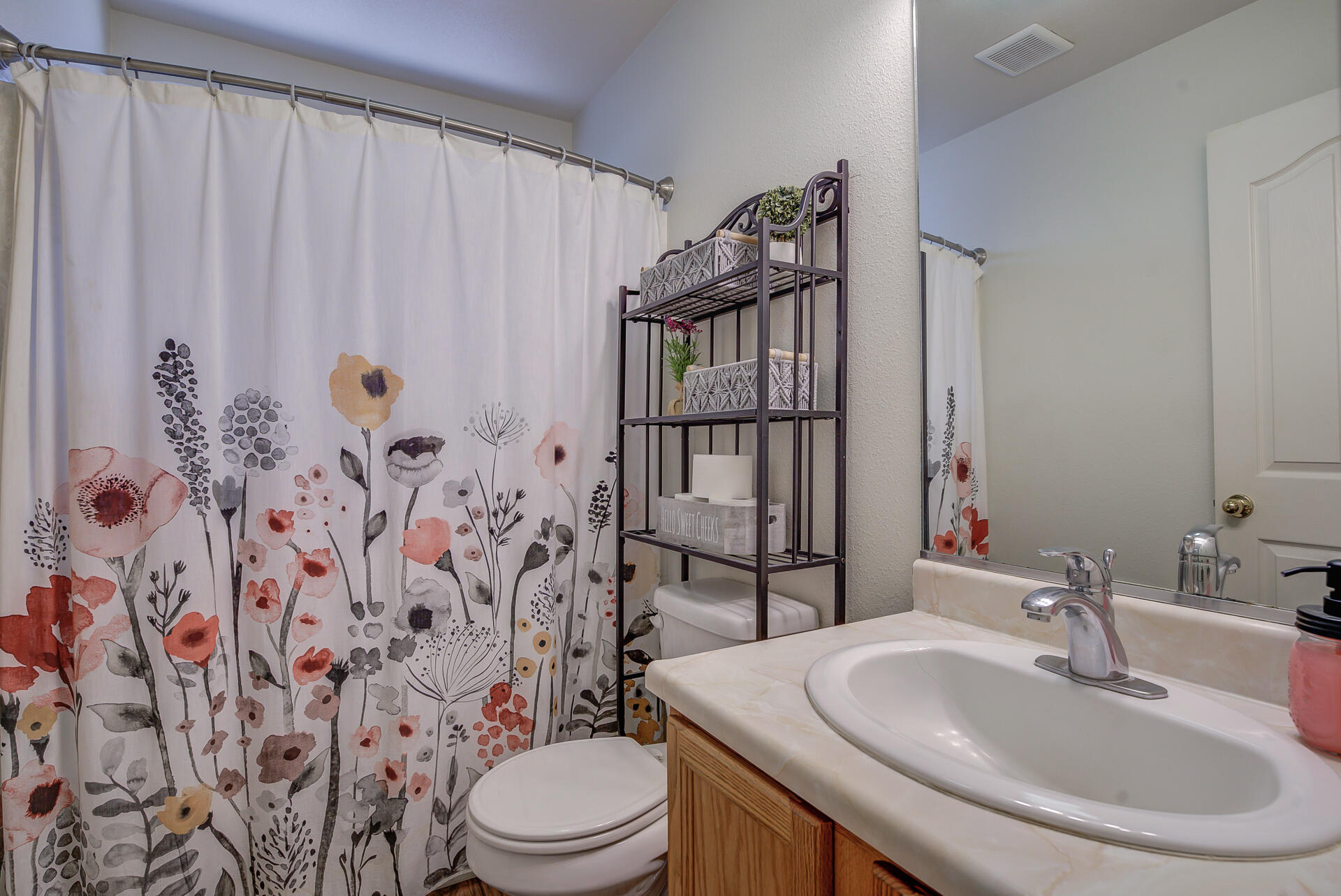 3343 Oak Street Anderson, CA 96007 - Photo 18 of 28 a bathroom with a sink toilet and shower