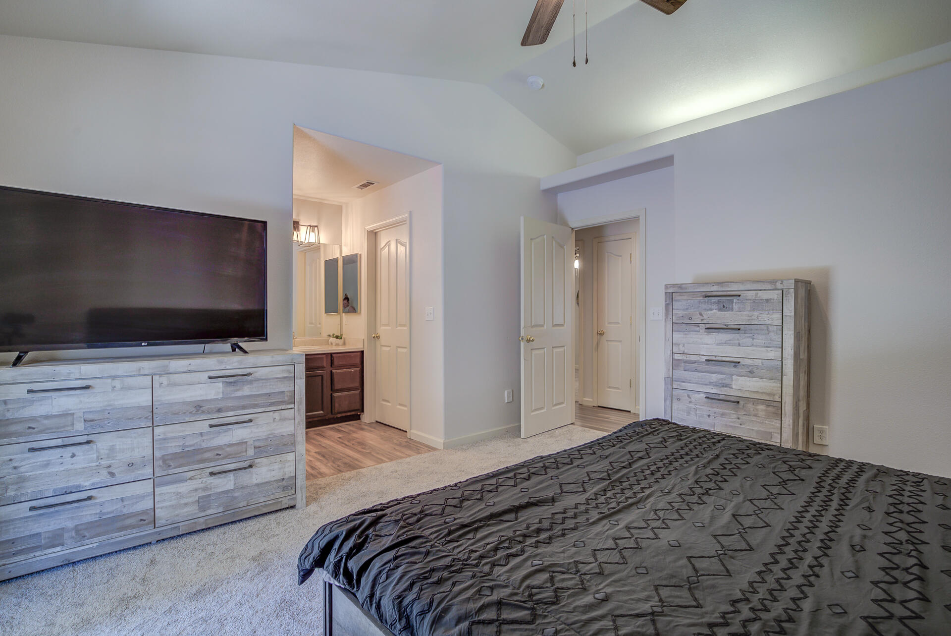 3343 Oak Street Anderson, CA 96007 - Photo 21 of 28 a bedroom with a bed and flat screen tv