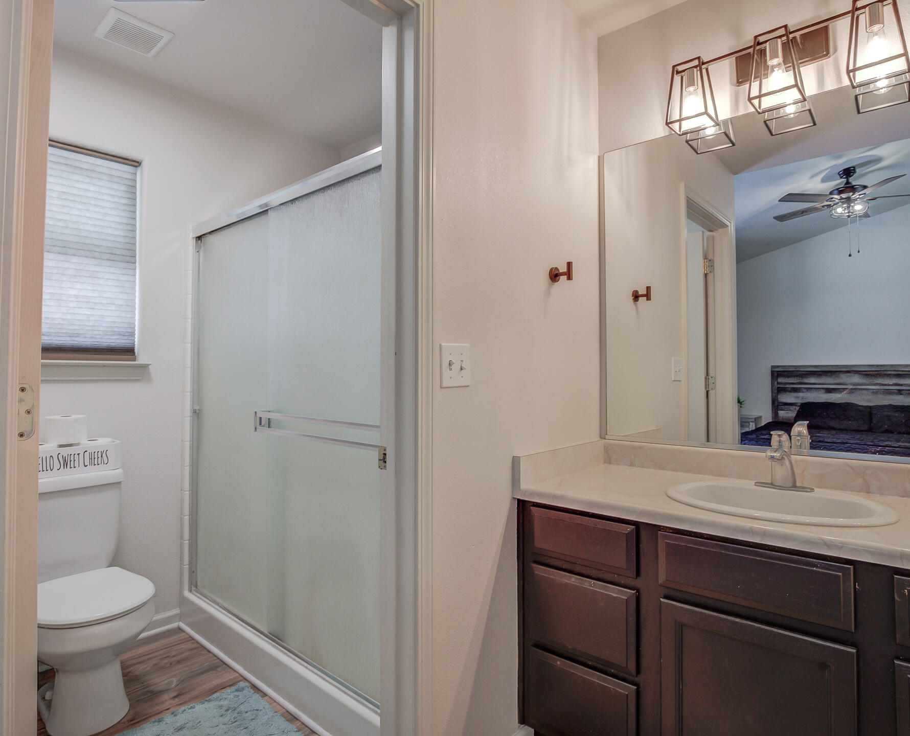 3343 Oak Street Anderson, CA 96007 - Photo 24 of 28 a bathroom with a granite countertop sink toilet and shower