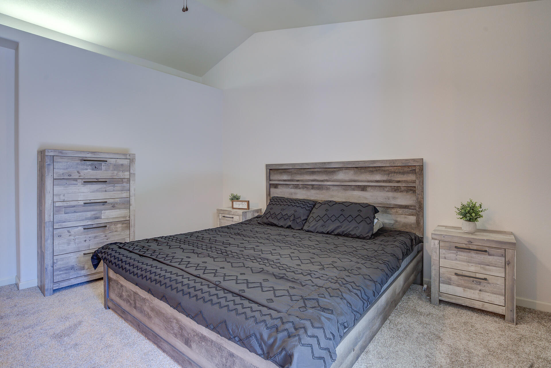 3343 Oak Street Anderson, CA 96007 - Photo 25 of 28 a bedroom with a bed and a dresser