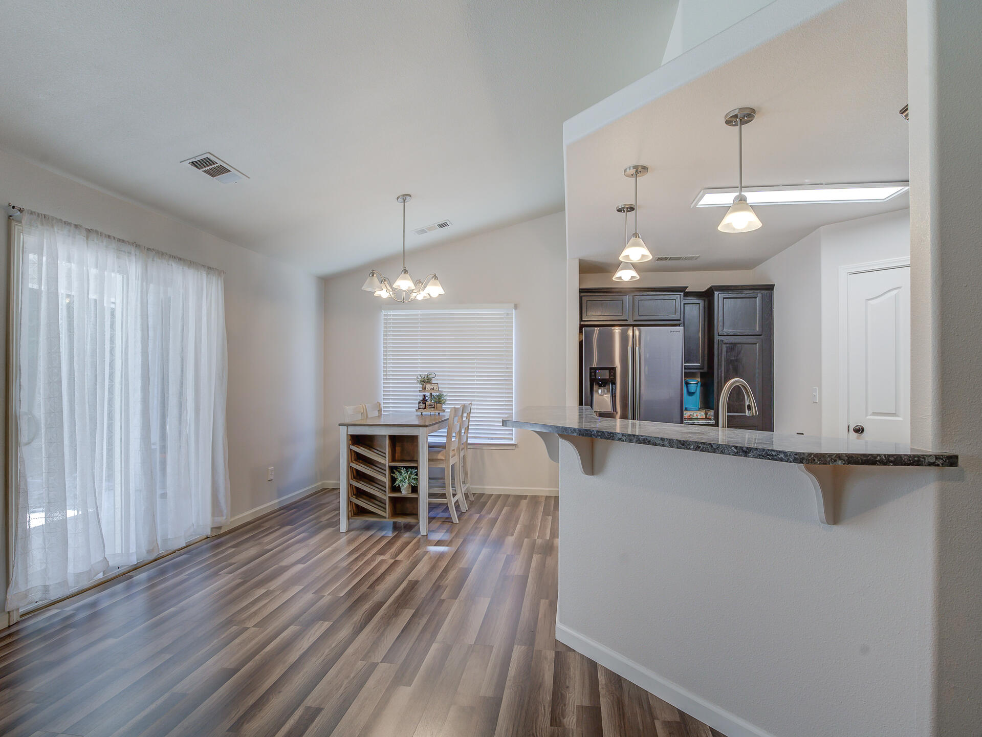 3343 Oak Street Anderson, CA 96007 - Photo 7 of 28 a view of a kitchen and dining room