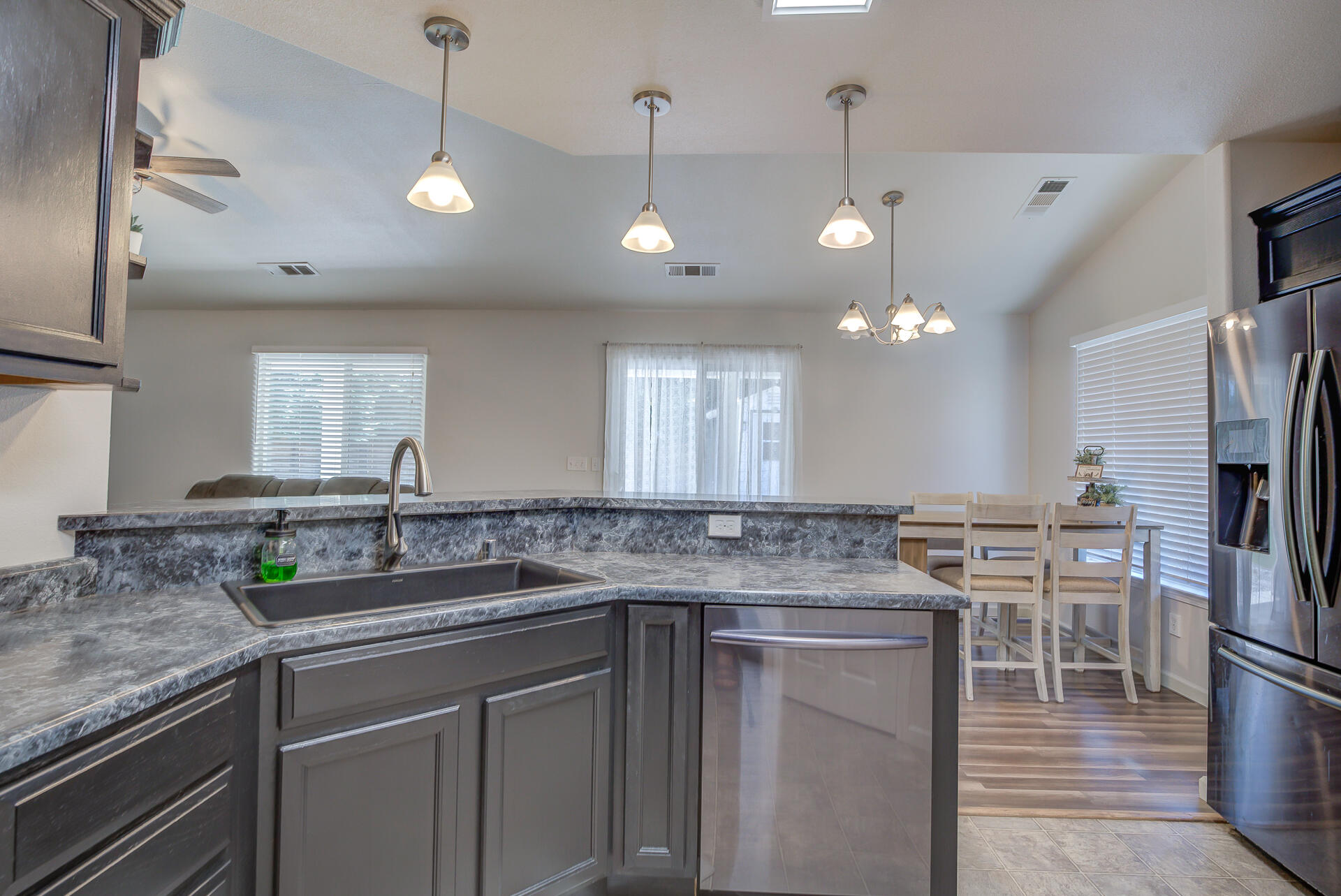 3343 Oak Street Anderson, CA 96007 - Photo 10 of 28 a kitchen with lots of counter space and stainless steel appliances