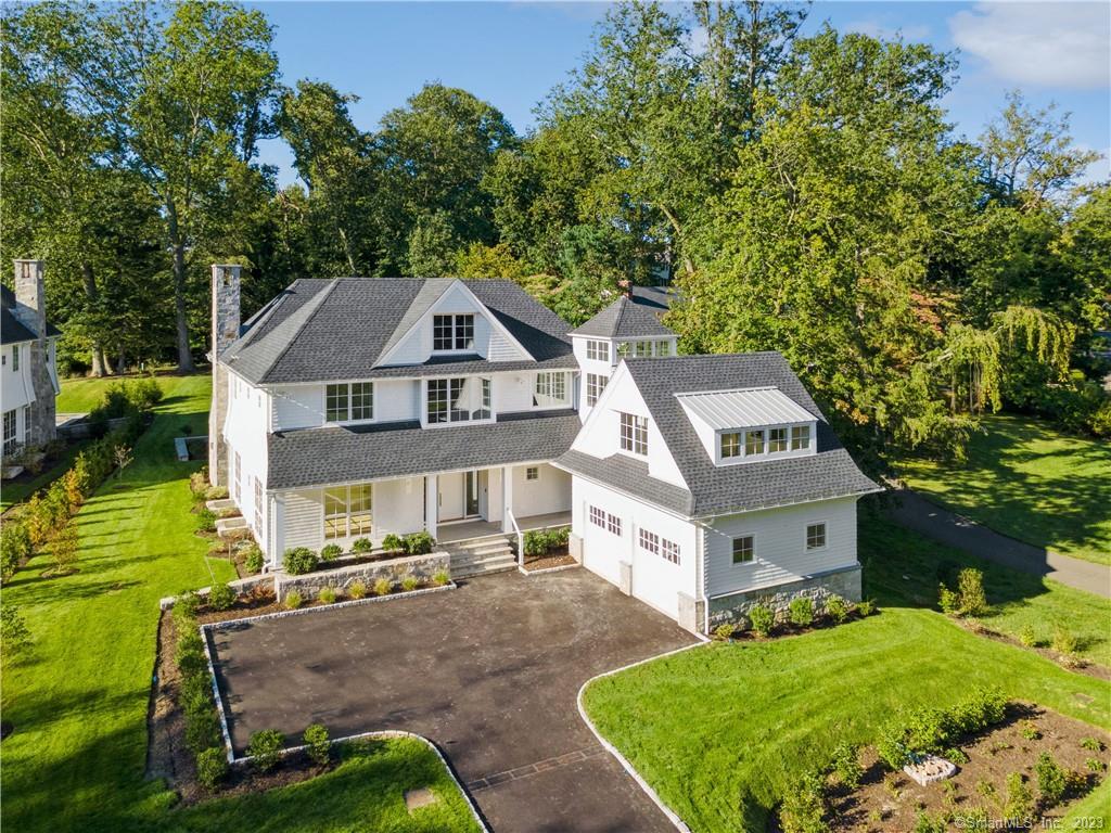 a aerial view of a house with a yard