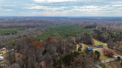 a view of a yard with an outdoor space