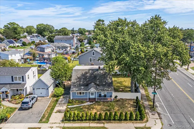 an aerial view of a house with a garden
