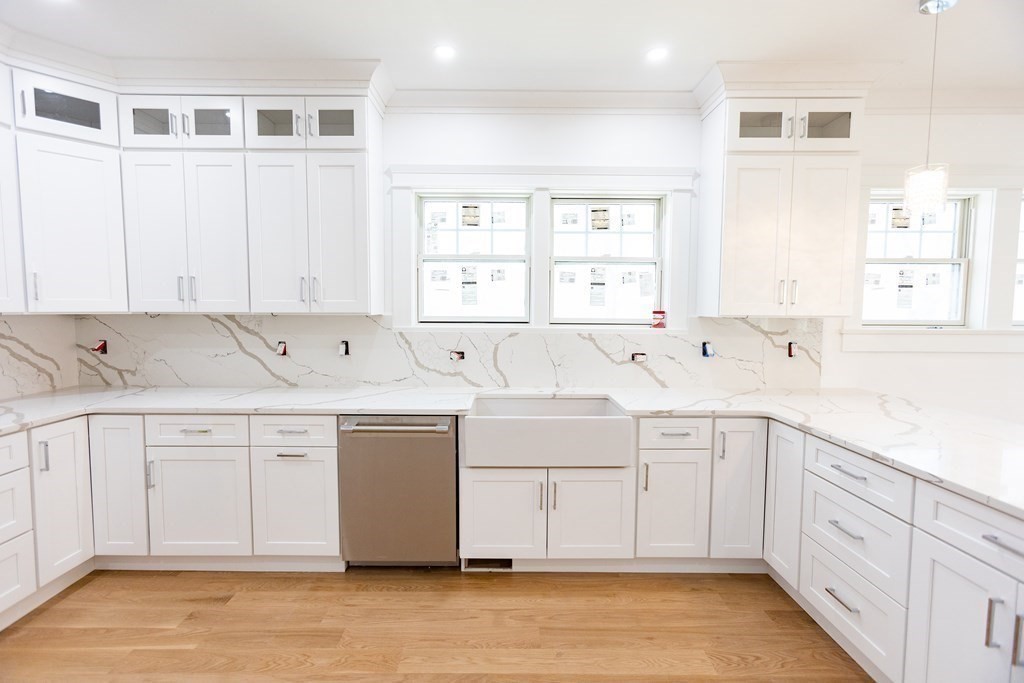 14 Lexington Road Wellesley, MA 02482 - Photo 8 of 19 a view of a kitchen with white cabinets