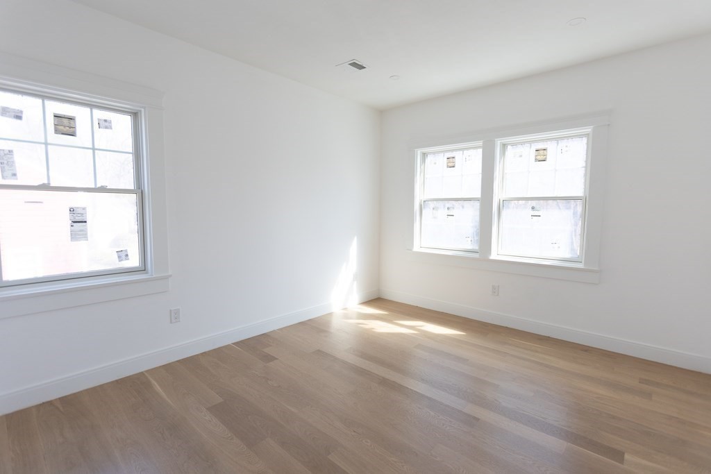 14 Lexington Road Wellesley, MA 02482 - Photo 10 of 19 an empty room with windows