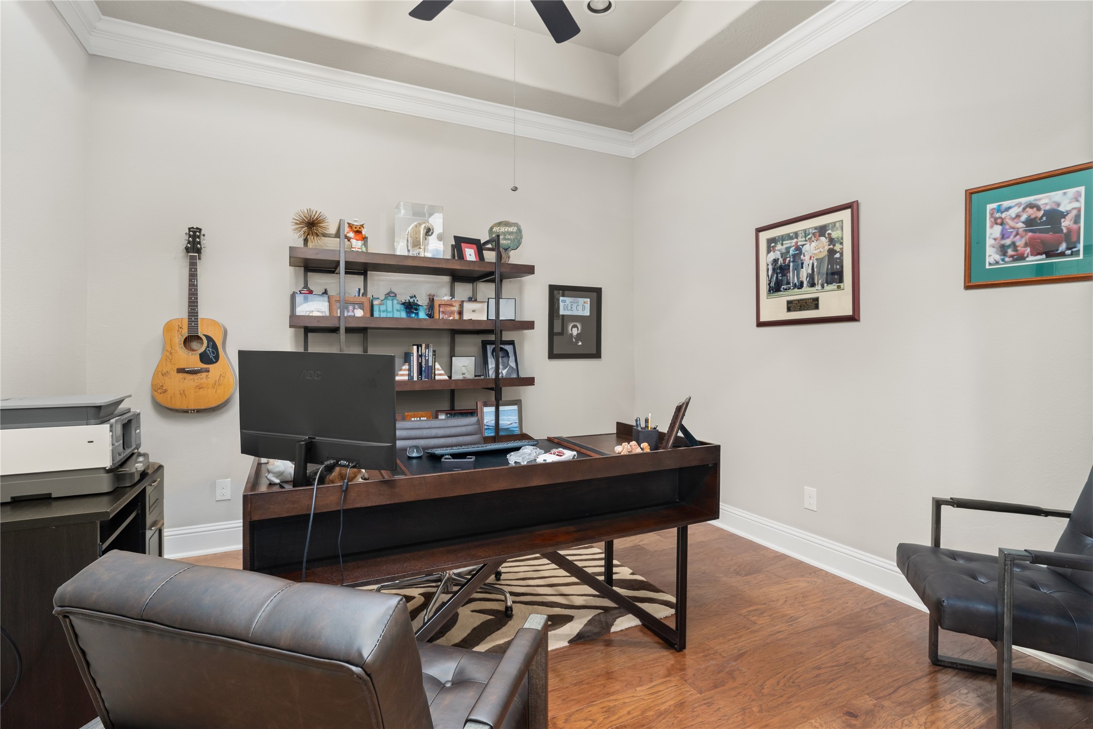 19813 Cullen Ridge Drive Porter, TX 77365 - Photo 29 of 44 Discover a stylish and inviting office space featuring elegant wood flooring, ample natural light, and tasteful decor that inspires productivity and creativity.