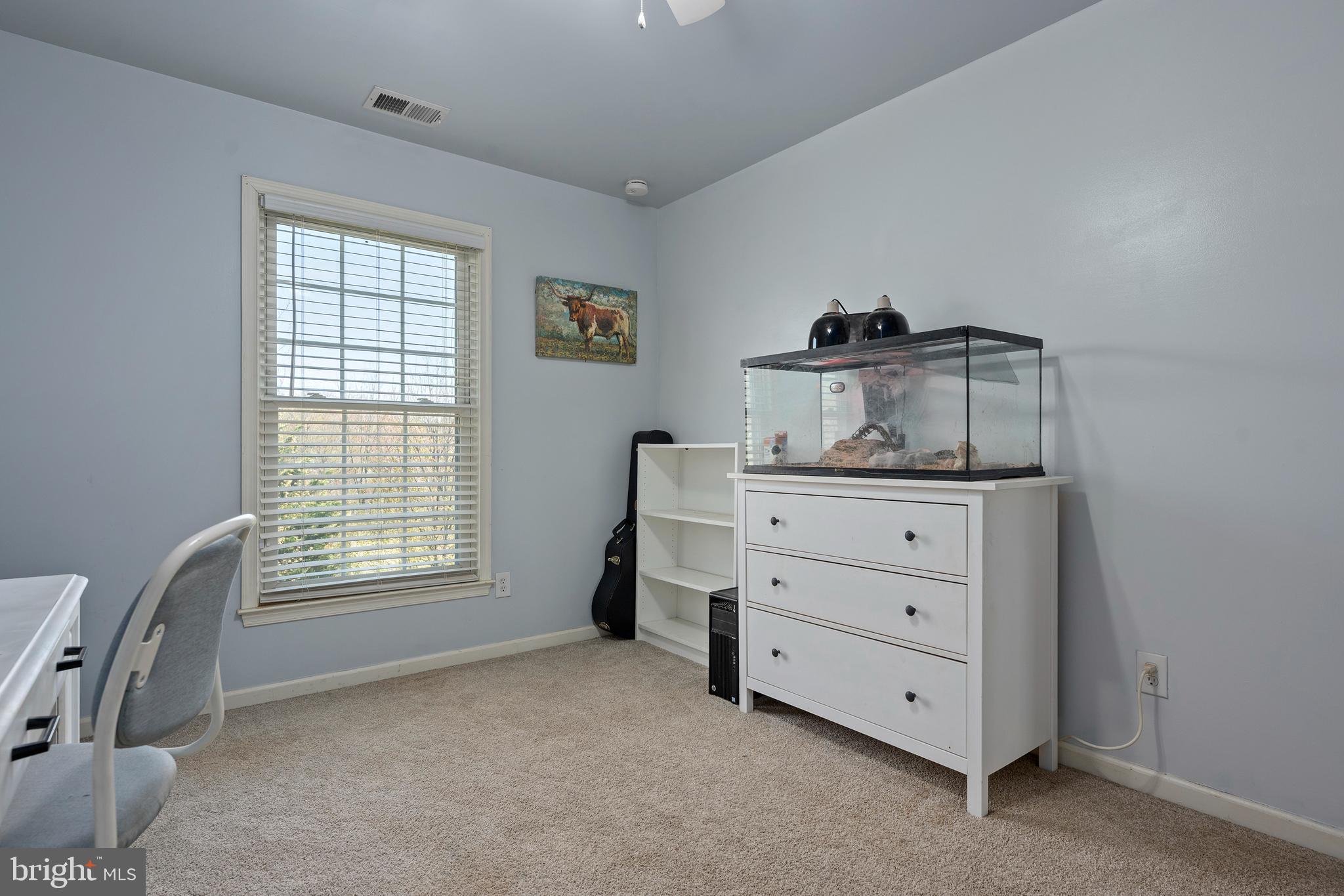 4525 Beckleysville Road Hampstead, MD 21074 - Photo 45 of 80 a room with a dresser and a window