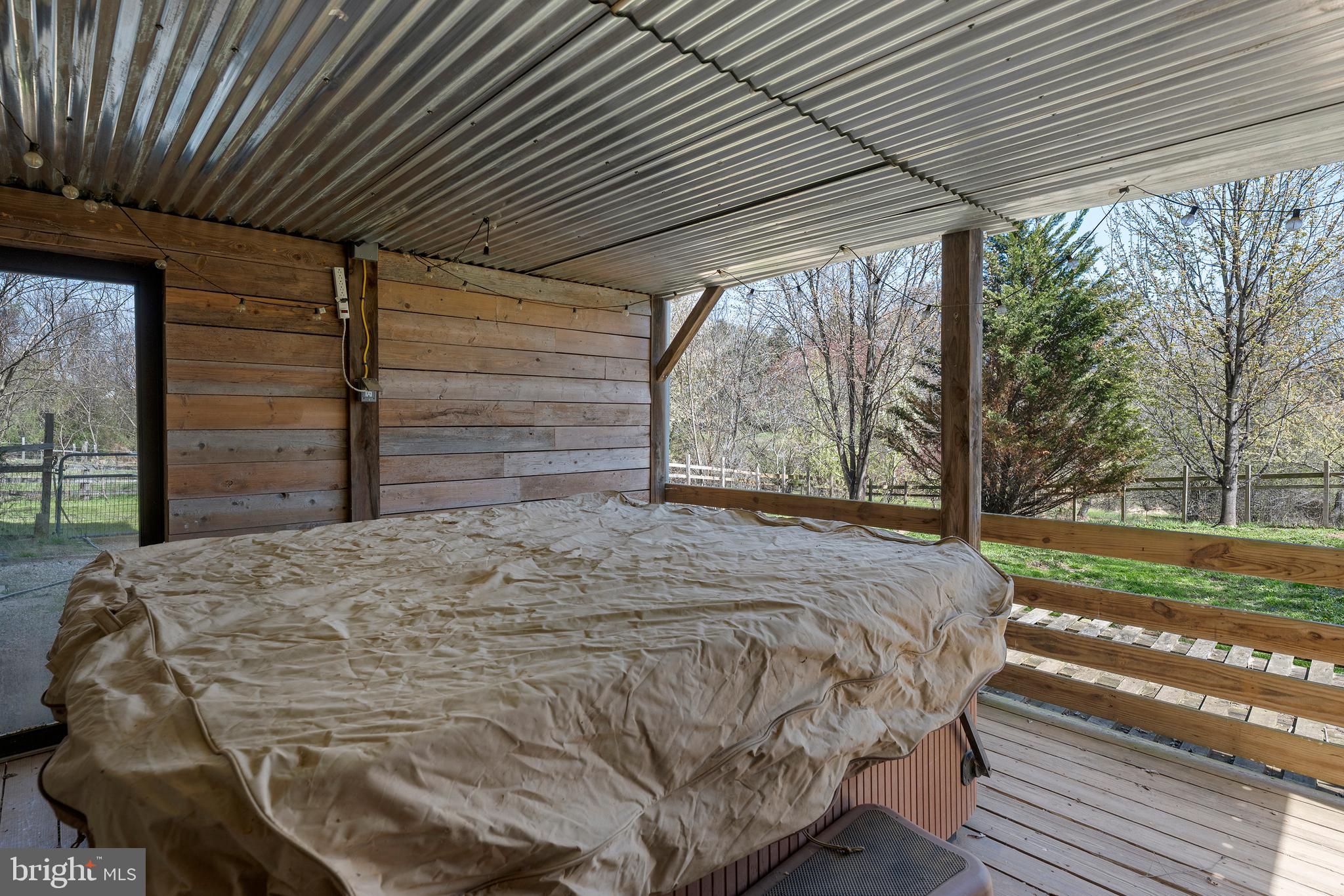 4525 Beckleysville Road Hampstead, MD 21074 - Photo 52 of 80 a bed sitting in a spacious bedroom next to a yard