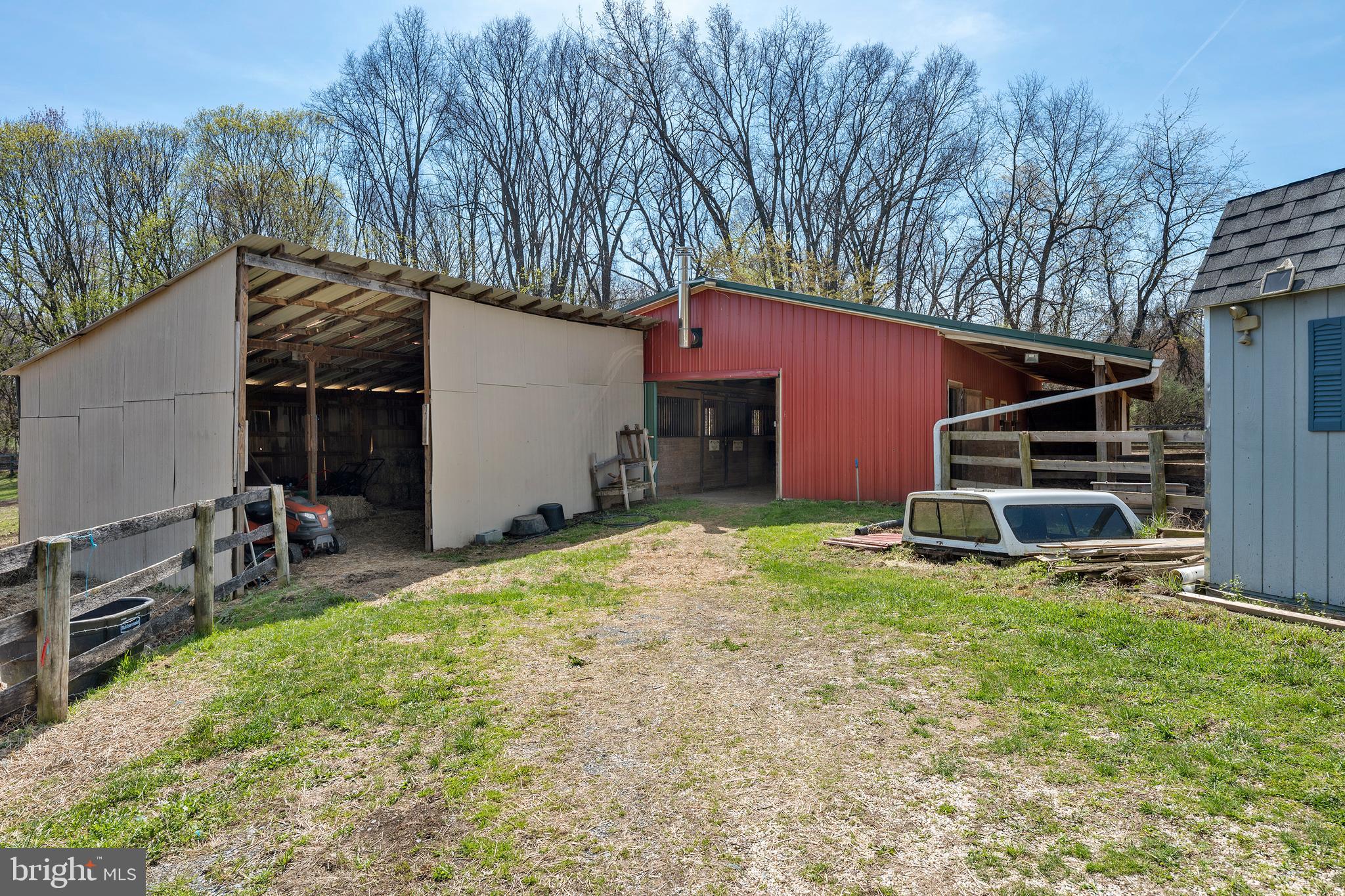 4525 Beckleysville Road Hampstead, MD 21074 - Photo 63 of 80 a view of backyard with wooden fence and a large tree