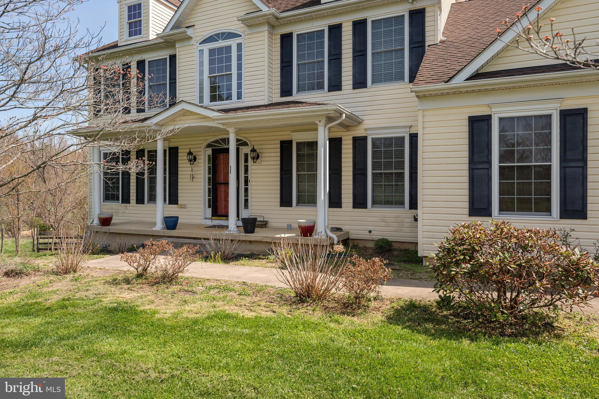 4525 Beckleysville Road Hampstead, MD 21074 - Photo 8 of 80 a front view of a house with a yard