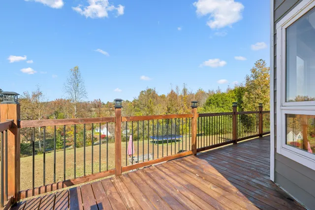 a kitchen with a table and chairs in it