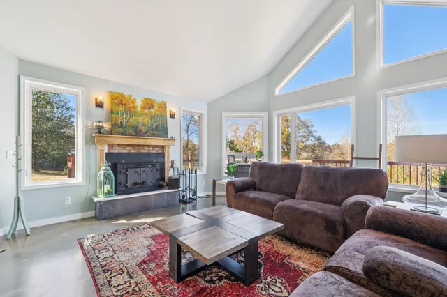 a view of walk in closet with a large window