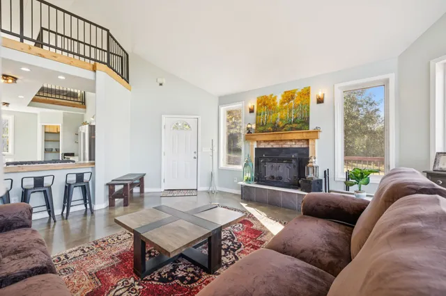 a bath tub sitting in a bathroom next to a window